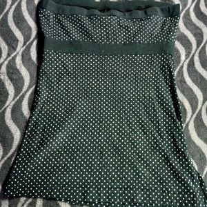 Polka dot strapless shirt with a split up both sides